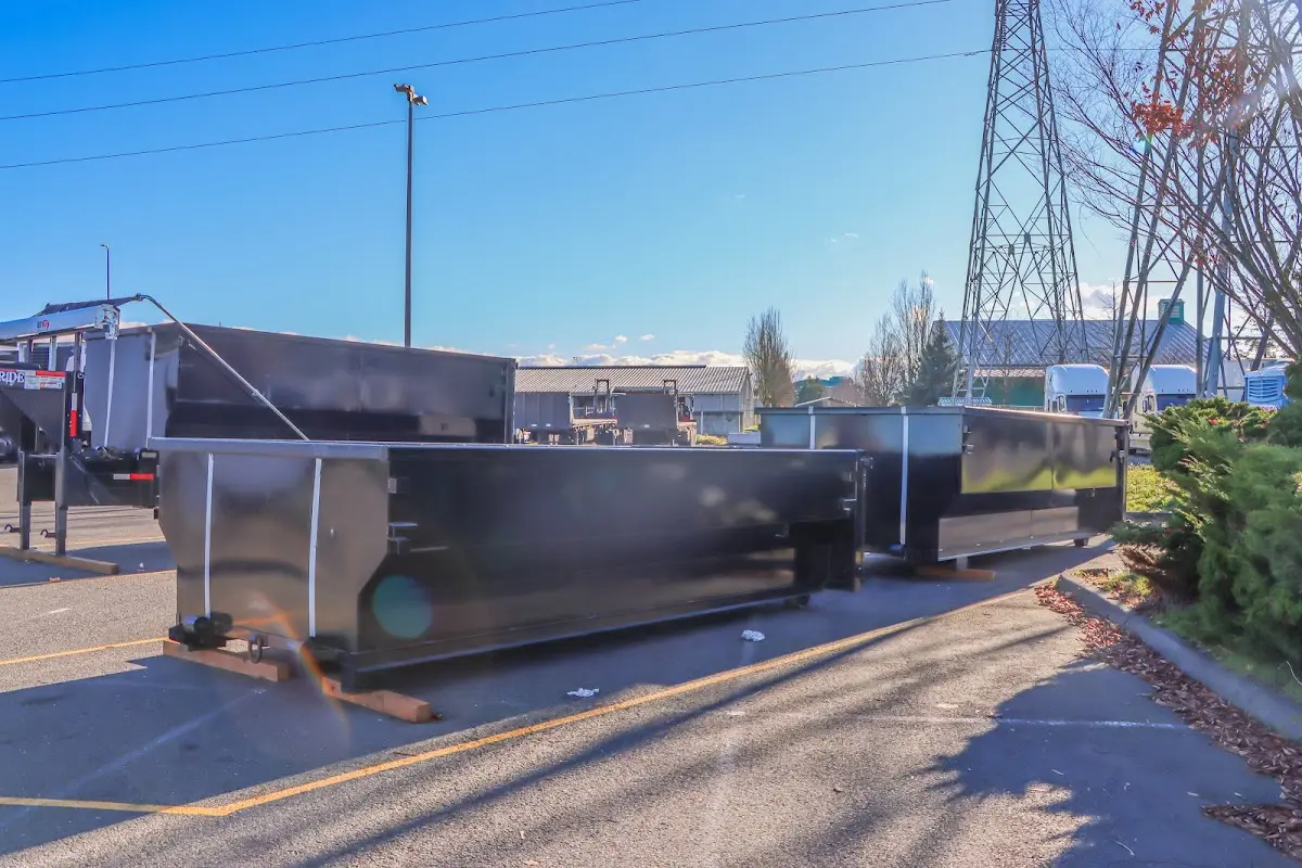 Roll-off dumpster ready for waste disposal at job site for 3 Yard Dumpster Rental in Rome